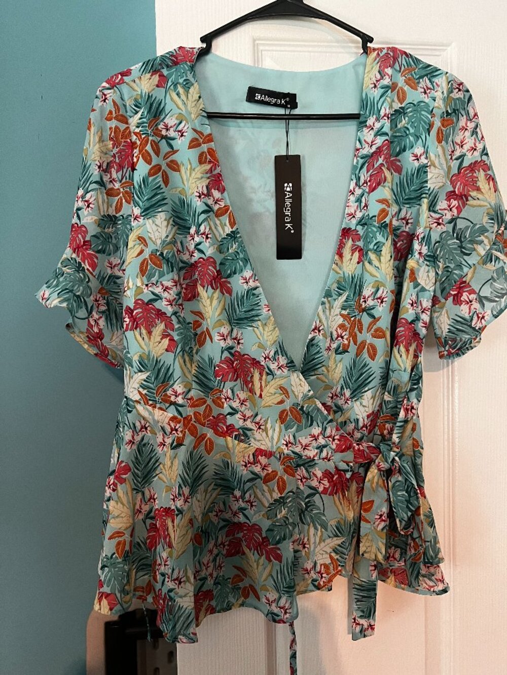 Pretty wrap around blouse in Medium